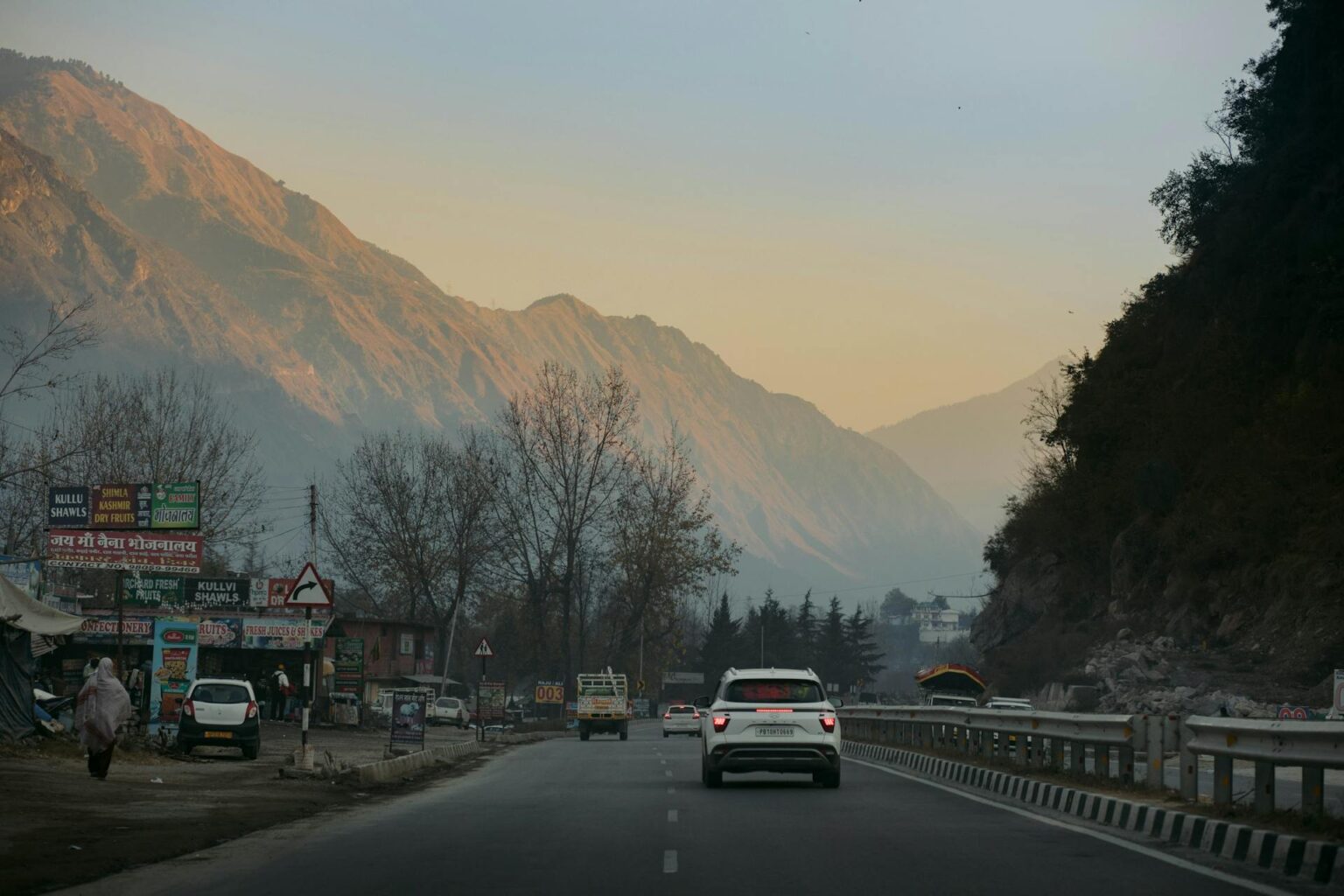 Outstation cab journey through scenic mountain roads during a Himachal tour from Delhi